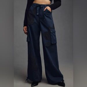 Anthropologie Navy Wide-Leg Cargo Pants with Black Floral Appliqué